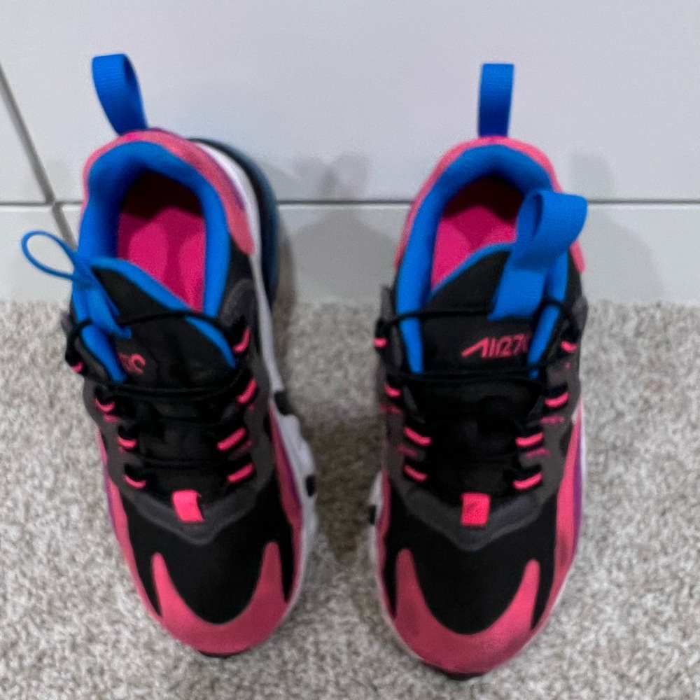 Pink and black Nike Air 70